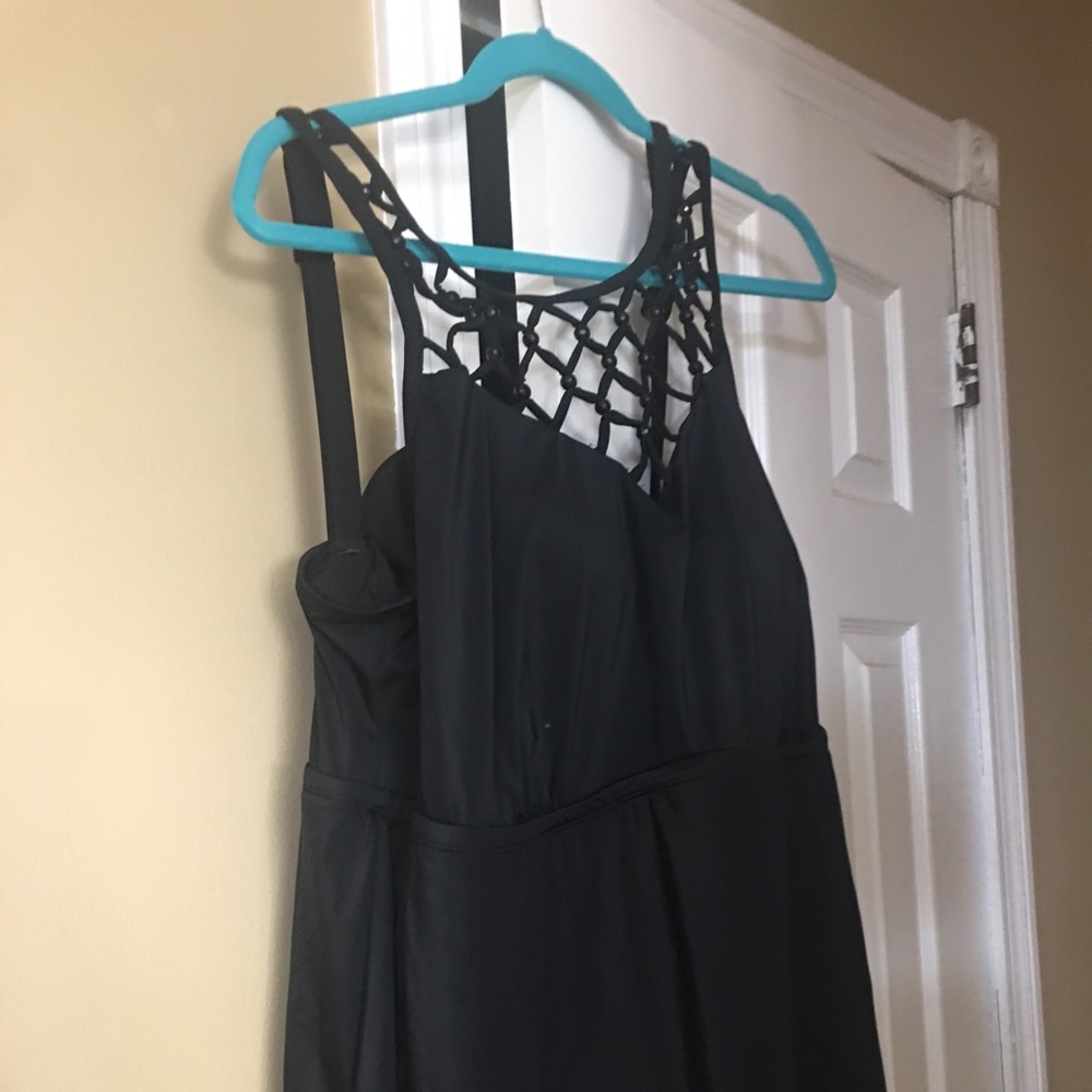 Brand new with the tags still on. Black swim dress